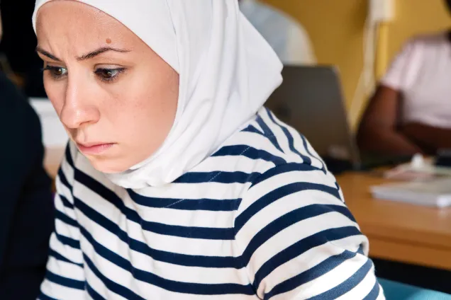 Photo of a student at the computer.