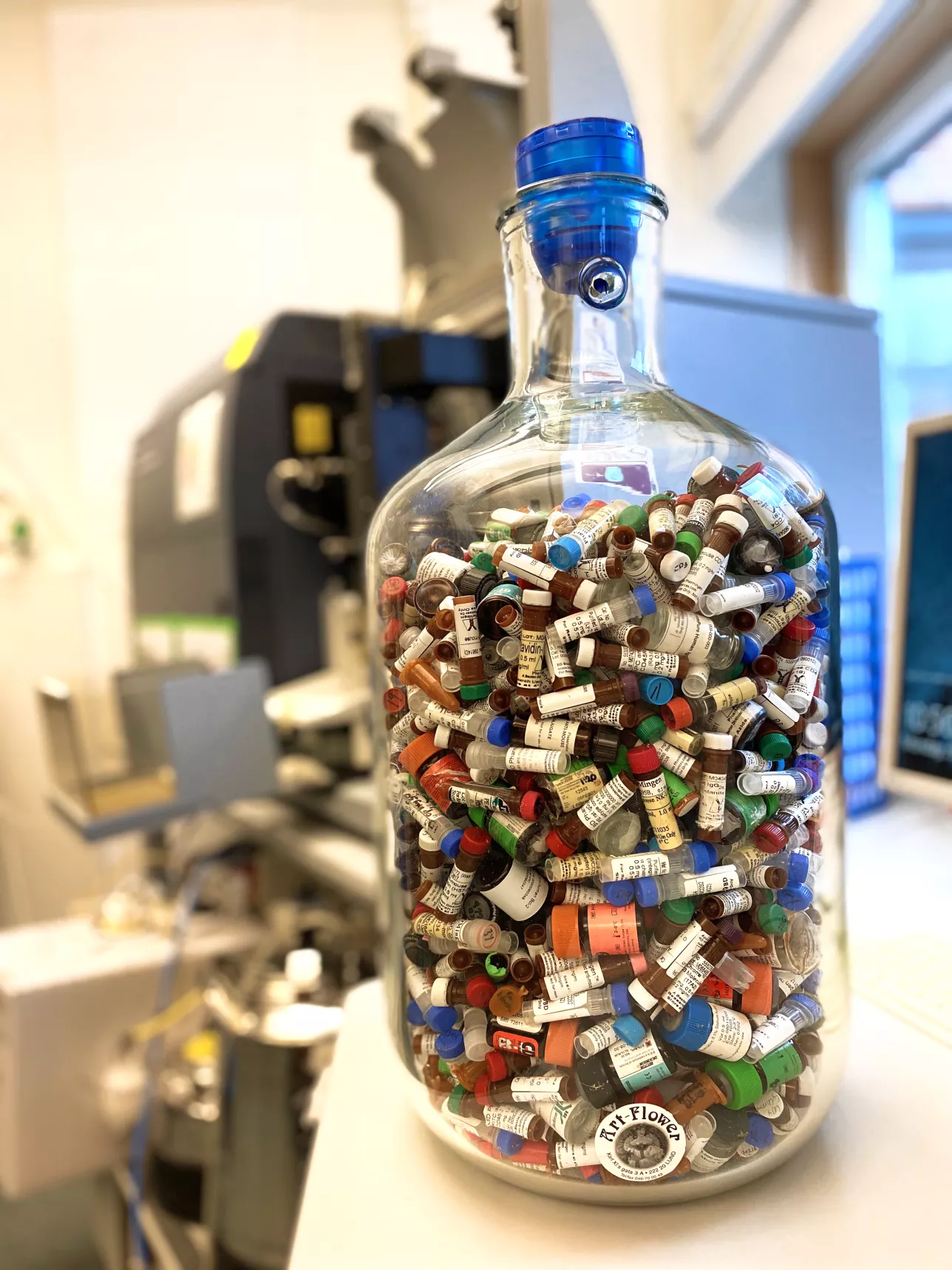 Image of a collection of sample tubes in a large jar.