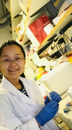 PhD Student, Ouyang Yuan in the lab.